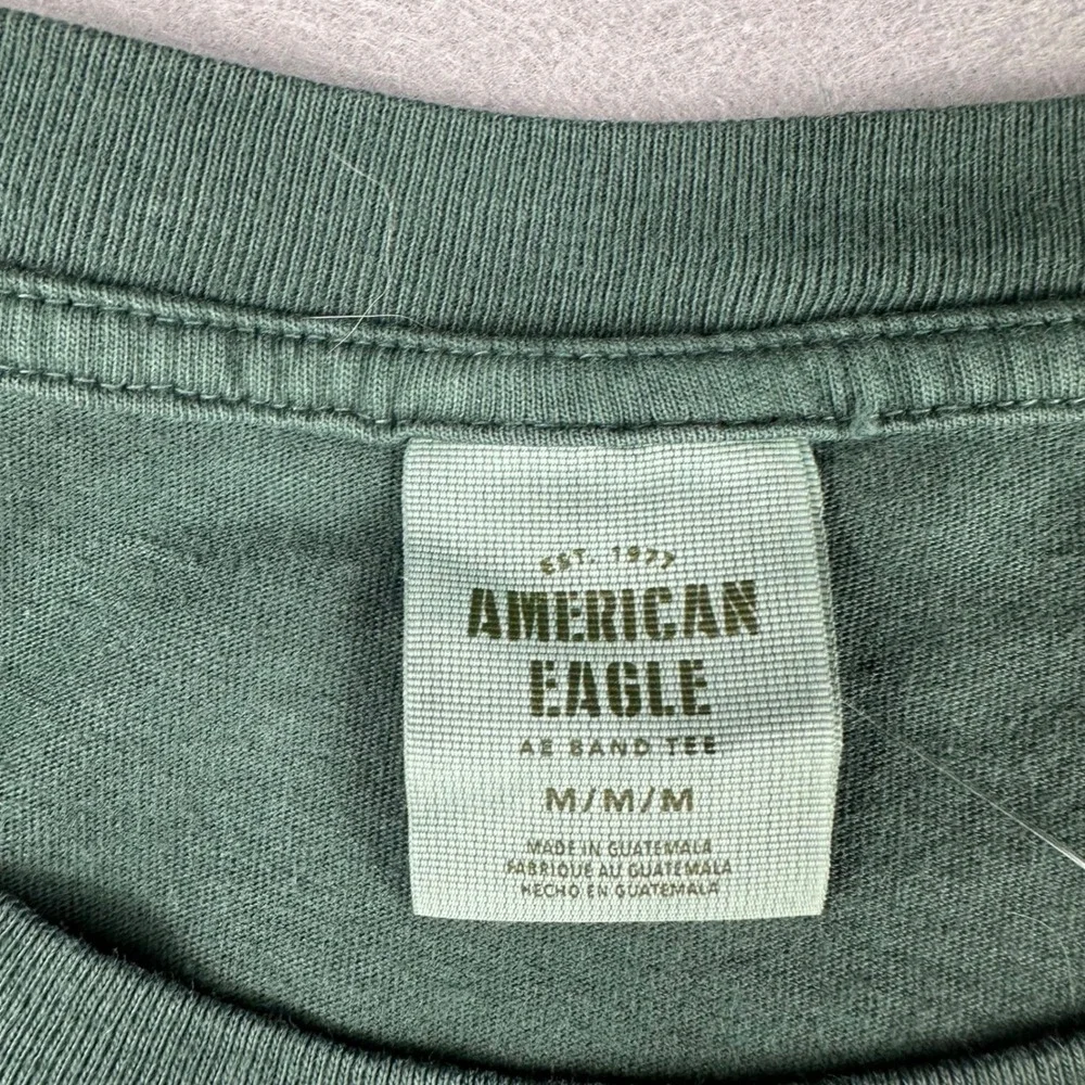 American Eagle Queen Tour 75 Graphic Band Tee Green Silver Glitter Mens M NEW